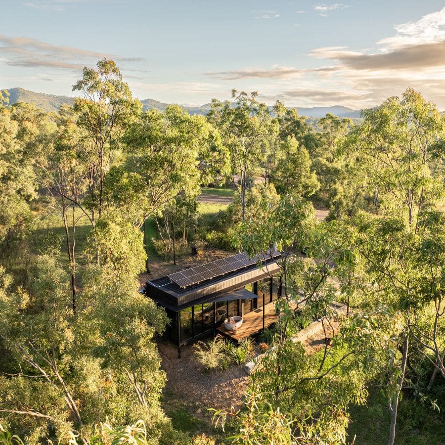 Wander in the Scenic Rim_Moy_21_Credit_Krista Eppelstun Aerial view of Moy WanderPod tucked into bushland in the Scenic Rim